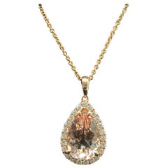 14 Karat Yellow Gold Morganite Diamond Halo Necklace