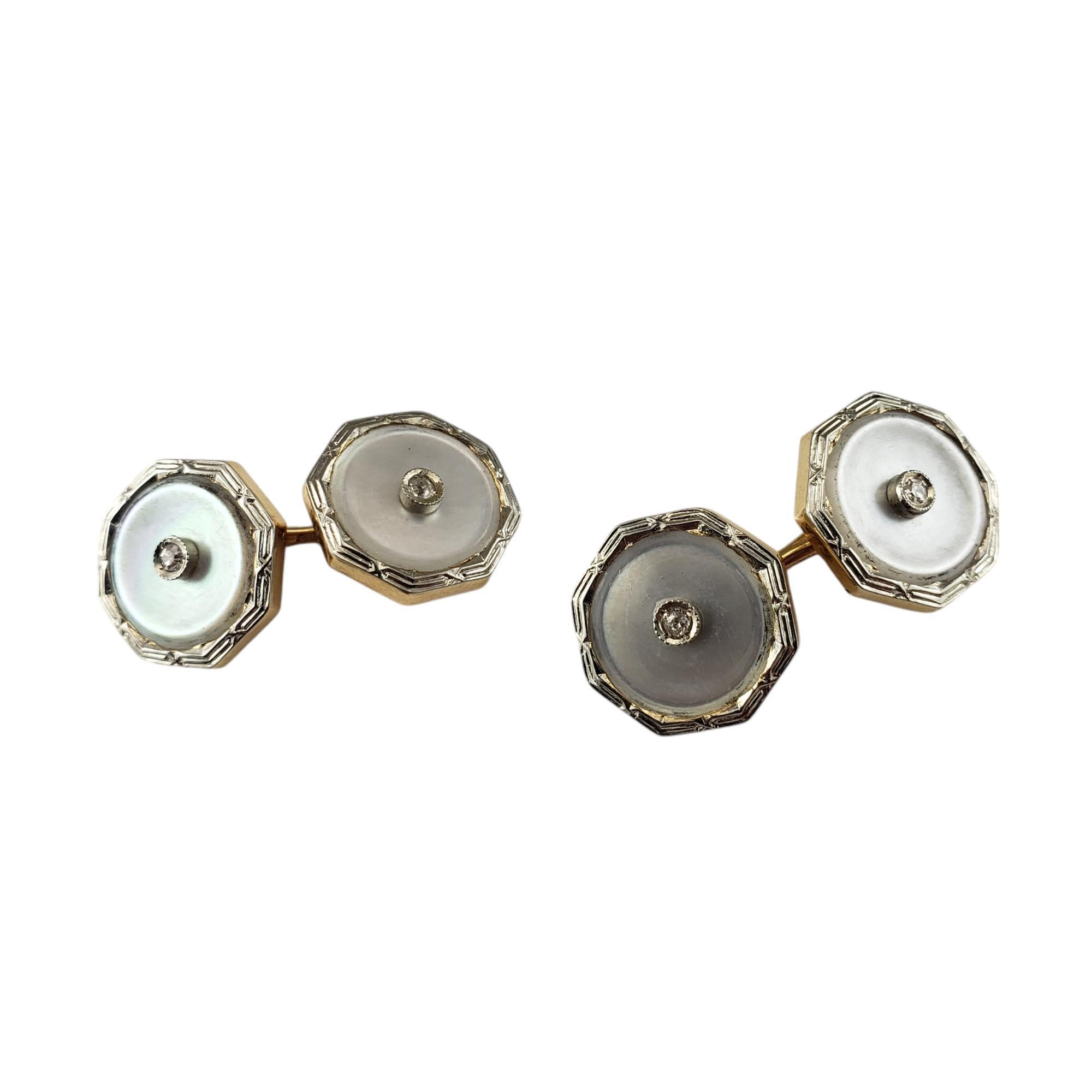 14K Yellow Gold Mother of Pearl and Diamond Cufflinks-

These elegant mother of pearl cufflinks are crafted in 14K yellow gold and mother of pearl and are each accented with two round single cut diamonds.

Matching button set: #19935

Approximate
