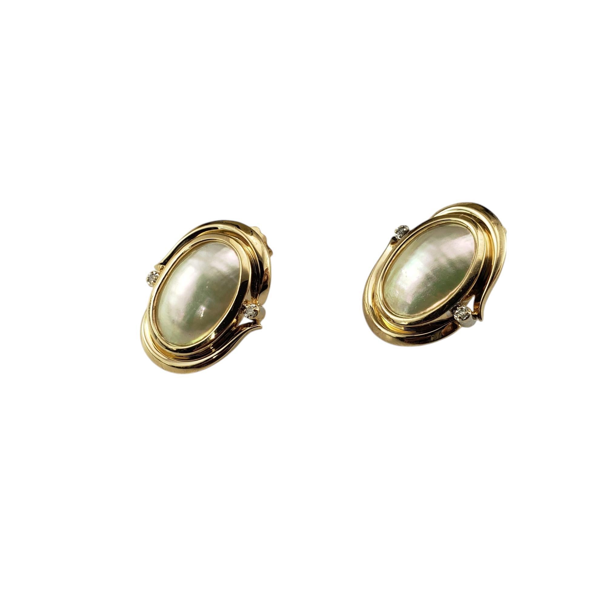 14 Karat Yellow Gold Mother of Pearl and Diamond Earrings-

These stunning earrings each feature one mother of pearl stone and two single cut diamonds set in 14K yellow gold. Push back closures.

Approximate total diamond weight: .03 ct.

Diamond