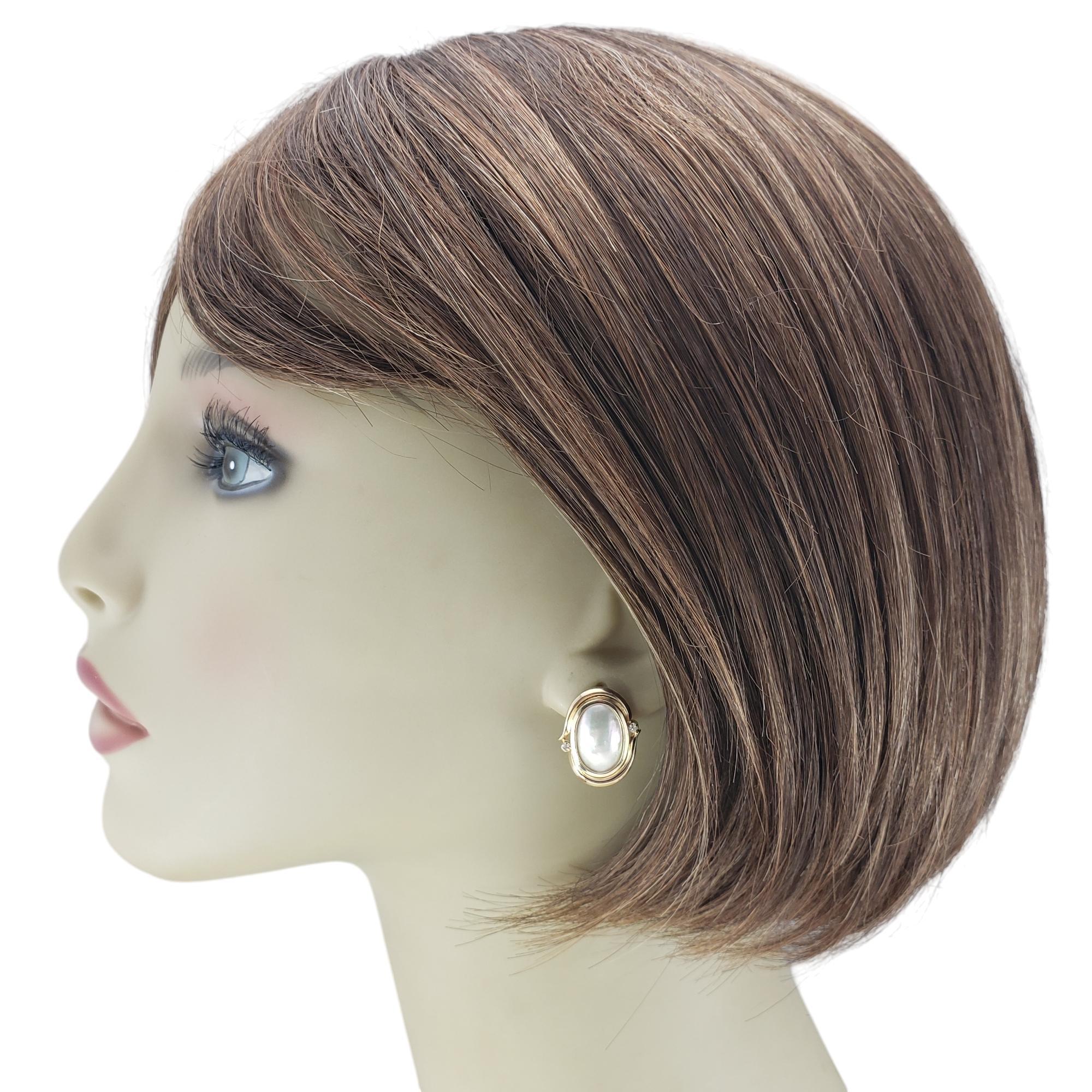 14 Karat Yellow Gold Mother of Pearl and Diamond Earrings #19756 For Sale 1