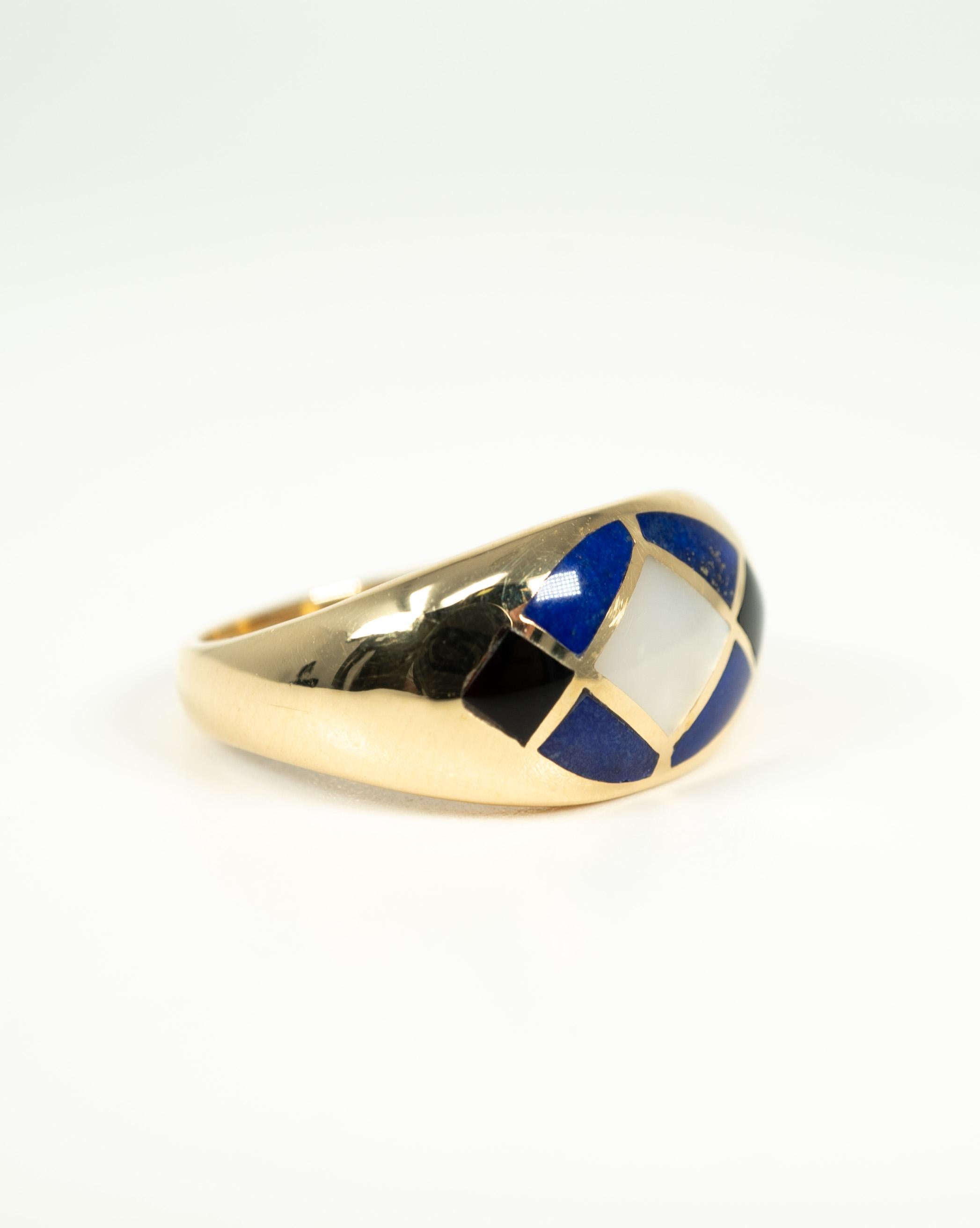 In 14 karat yellow gold, this ring features beautiful inlays of mother-of-pearl, lapis lazuli and onyx!