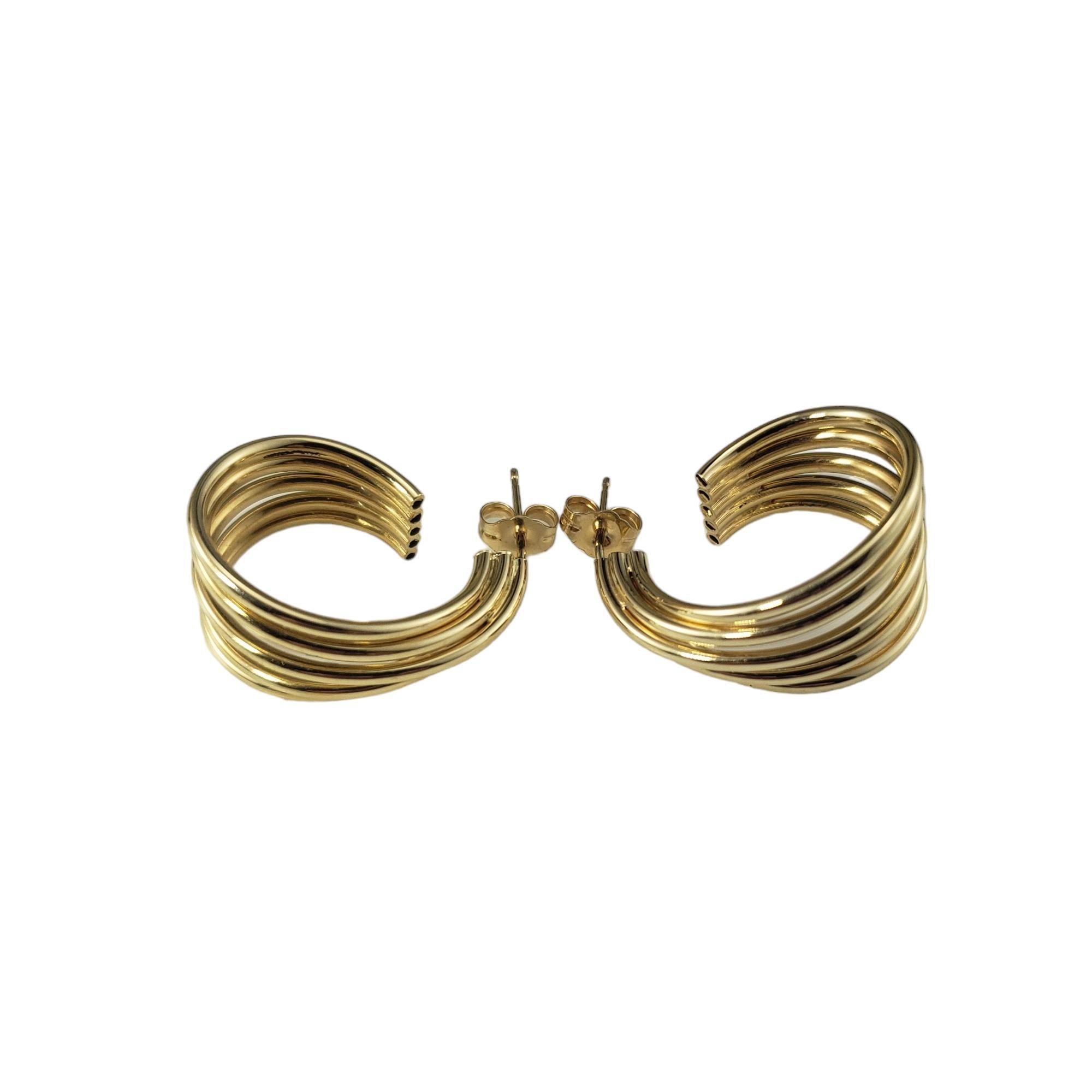 14 Karat Yellow Gold Hoop Earrings-

These elegant hoop earrings are crafted in beautifully detailed 14K yellow gold.  

Push back closures. 

Width: 14.5 mm.

Size: 24 mm x 14.5 mm

Stamped: 14

Weight: 2.8 dwt./4.4 gr.

Very good condition,
