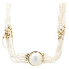 14 Karat Yellow Gold Multi Strand Pearl Necklace