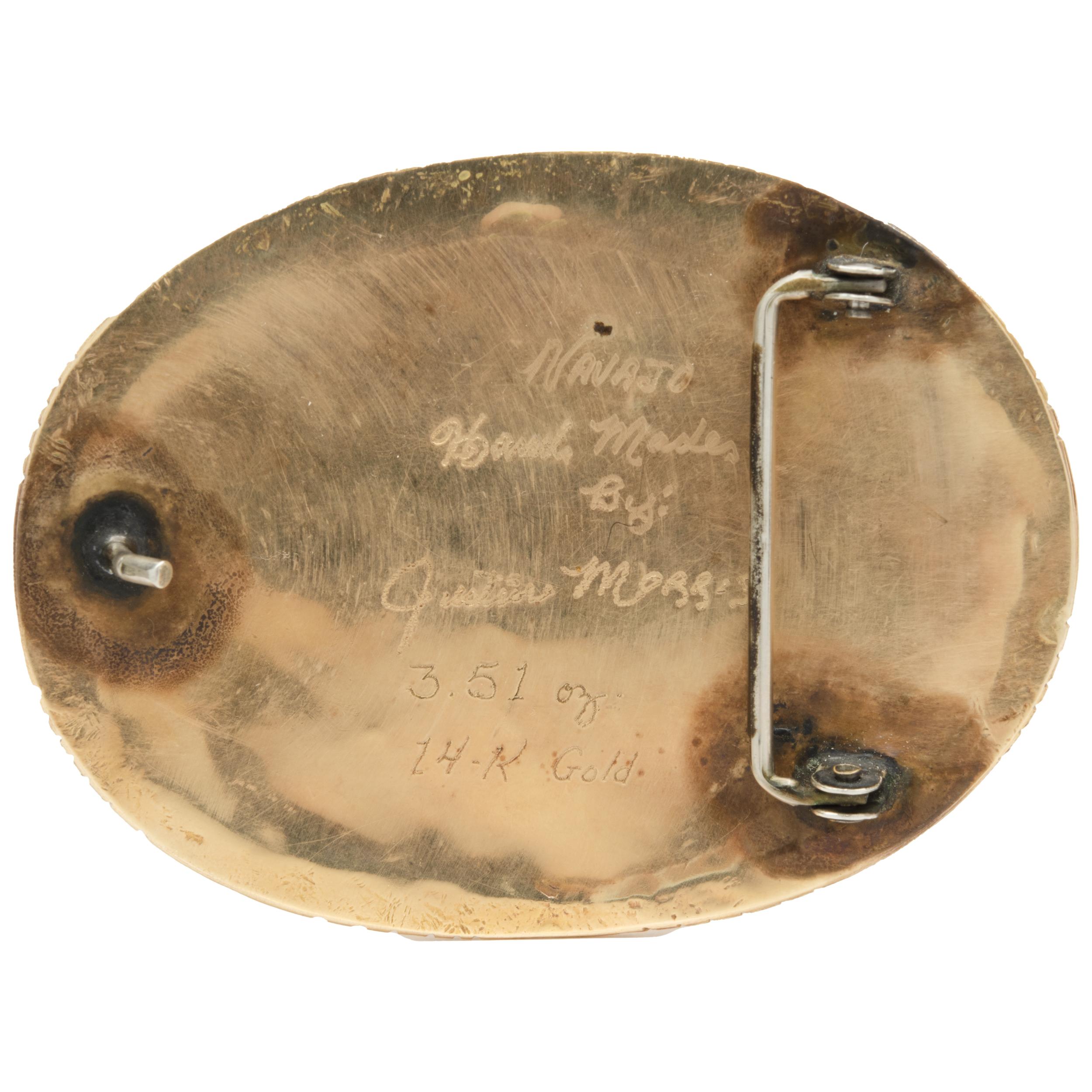 Concepteur : Justin Morris
Matériau : or jaune 14K
Dimensions : la boucle mesure 4 X 3 pouces
Poids : 108,49 grammes
