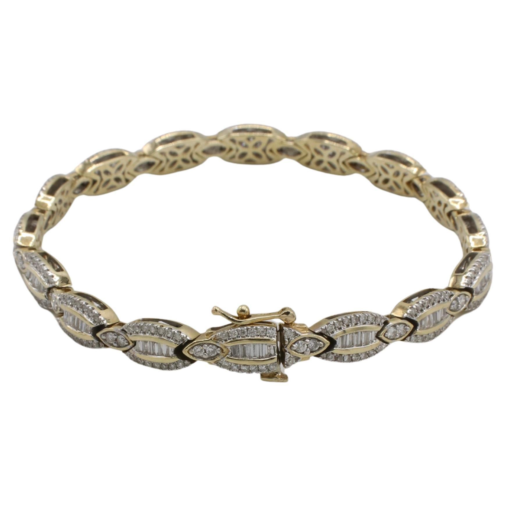 14 Karat Yellow Gold Natural Baguette & Round Diamond Tennis Line Bracelet 
Metal: 14k yellow gold
Weight: 15.81 grams
Diamonds: 2.24 CTW H-I VS round & baguette diamonds
Length: 7 inches
Width: 5.5mm
KDD F35000222