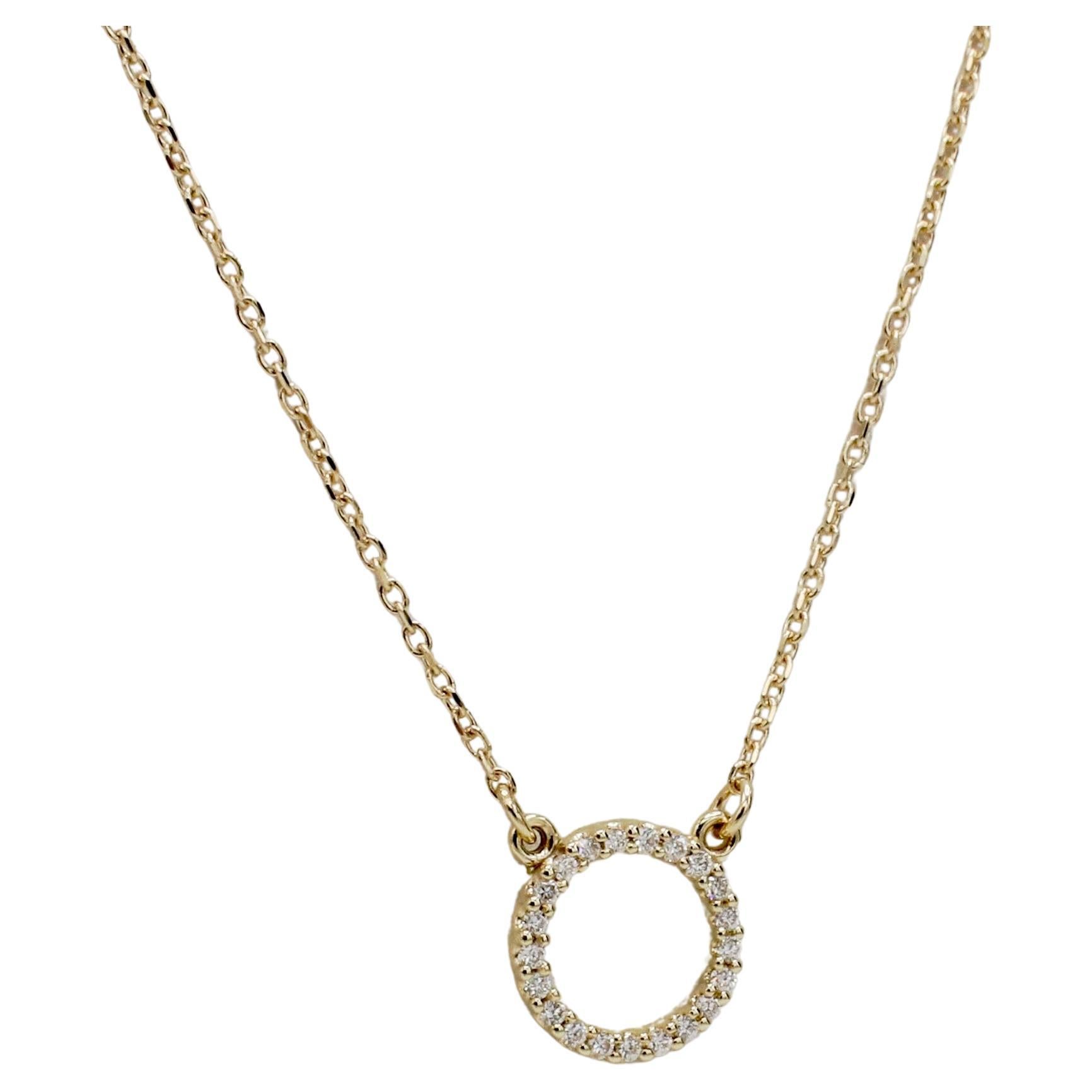 14 Karat Yellow Gold Natural Diamond Circle Pendant Necklace 
Metal: 14k yellow gold
Weight: 1.47 grams
Diamonds: .08 CTW natural round diamonds G-H SI
Length: 16 inches
Circle: 9mm
Note: Also available in white and rose gold