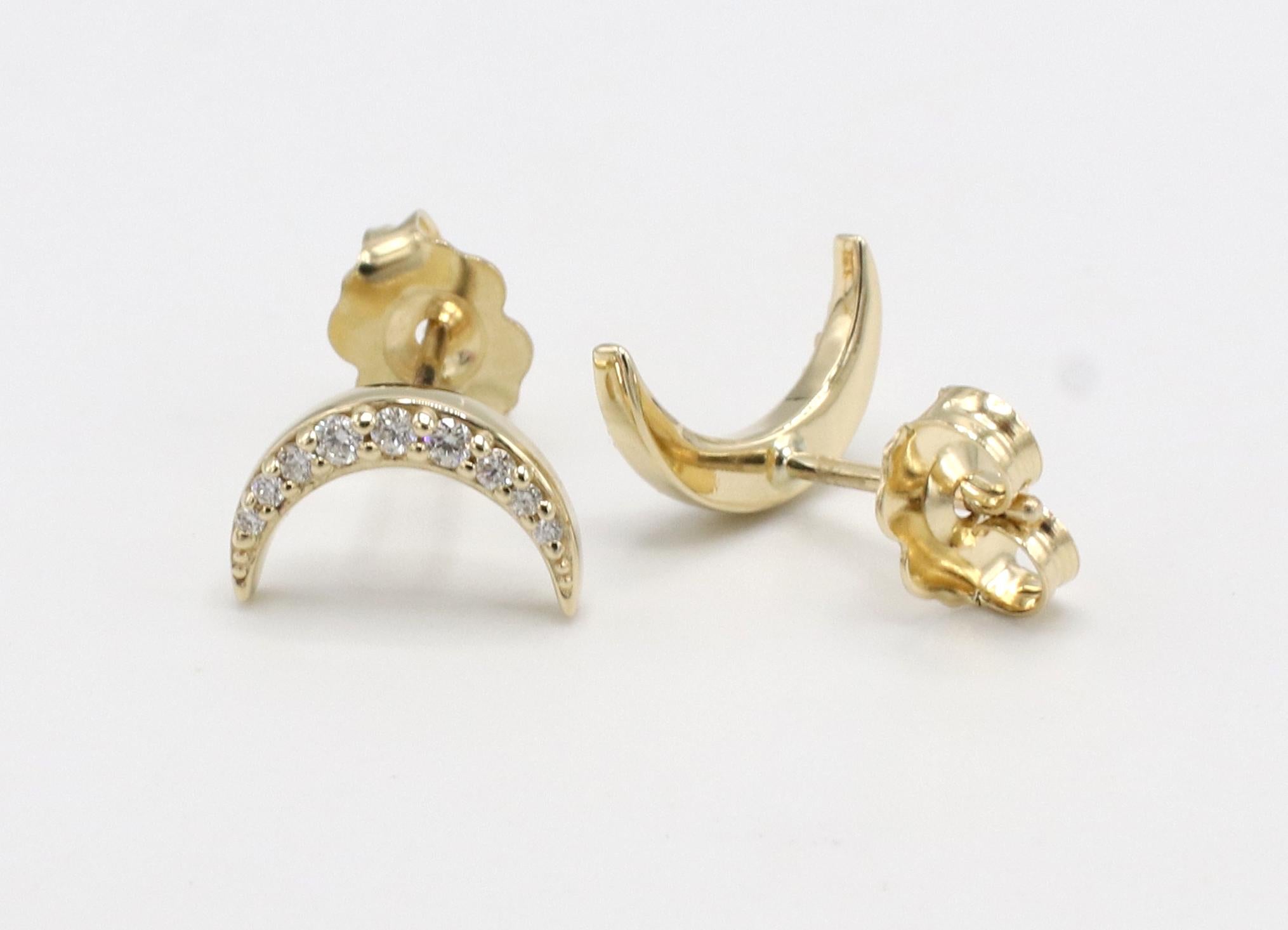 14 Karat Yellow Gold Natural Diamond Crescent Moon Stud Earrings 
Metal: 14k yellow gold
Weight: 1.31 grams
Diamonds: Approx. .10 CTW natural round diamonds H-I SI
Dimensions: 9.5 x 2mm
Backs: Push backs with posts
