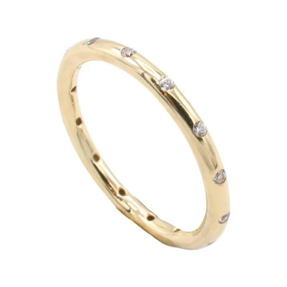 14 Karat Yellow Gold Natural Diamond Inlay Stacking Band Ring 
Metal: 14k yellow gold
Weight: 2.17 grams
Diamonds: Approx. 0.07 CTW G-H SI round natural diamonds
Size: 52 (6 US)
Width: 1.8mm
Height: 1.8mm
NT 111198-3
