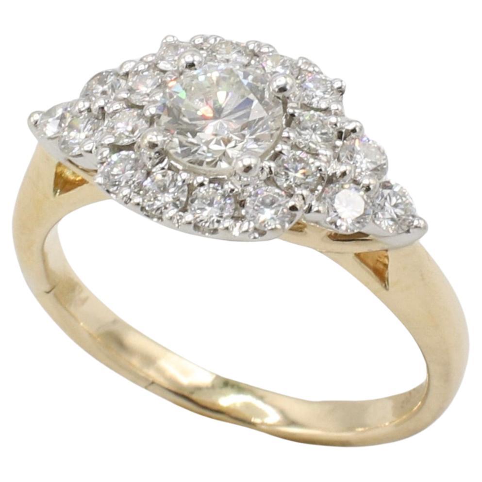 14 Karat Yellow Gold Natural Round Diamond Halo Engagement Ring 
Metal: 14k yellow gold
Weight: 3.3 grams
Diamonds: Approx. 1 CTW round natural H-I VS. Center stone is approx. .45 carats. 
Size: 5 (US)
Top width: 8.8mm
