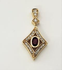 14 Karat Yellow Gold Natural Ruby and Diamond Pendant #24485