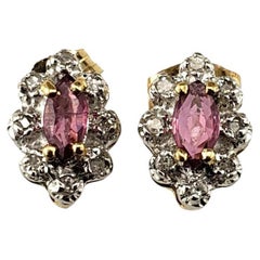 14 Karat Yellow Gold Natural Ruby and Diamond Stud Earrings #19057