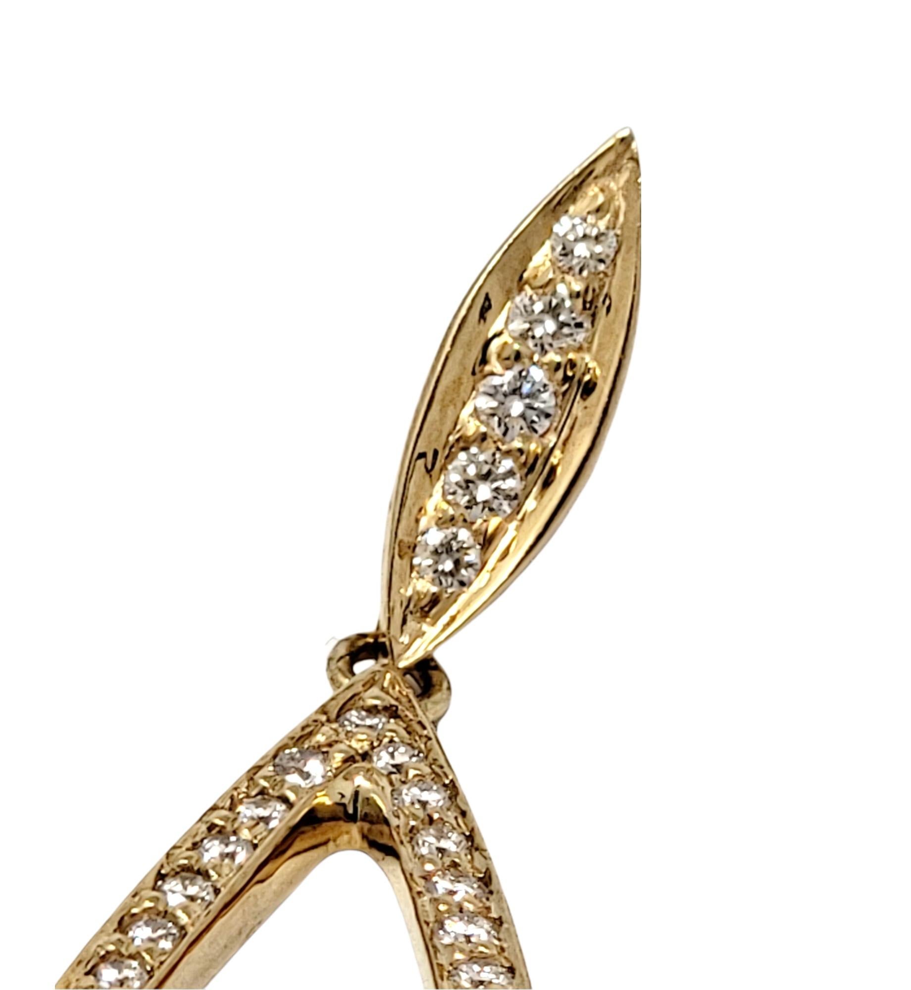 Round Cut 14 Karat Yellow Gold Navette Shaped Open Pave Diamond Drop Pierced Earrings For Sale