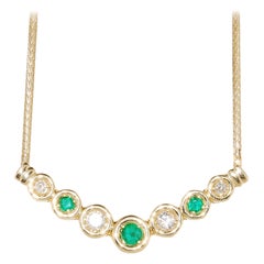 14 Karat Yellow Gold Neck-Piece with Emerald and Diamond