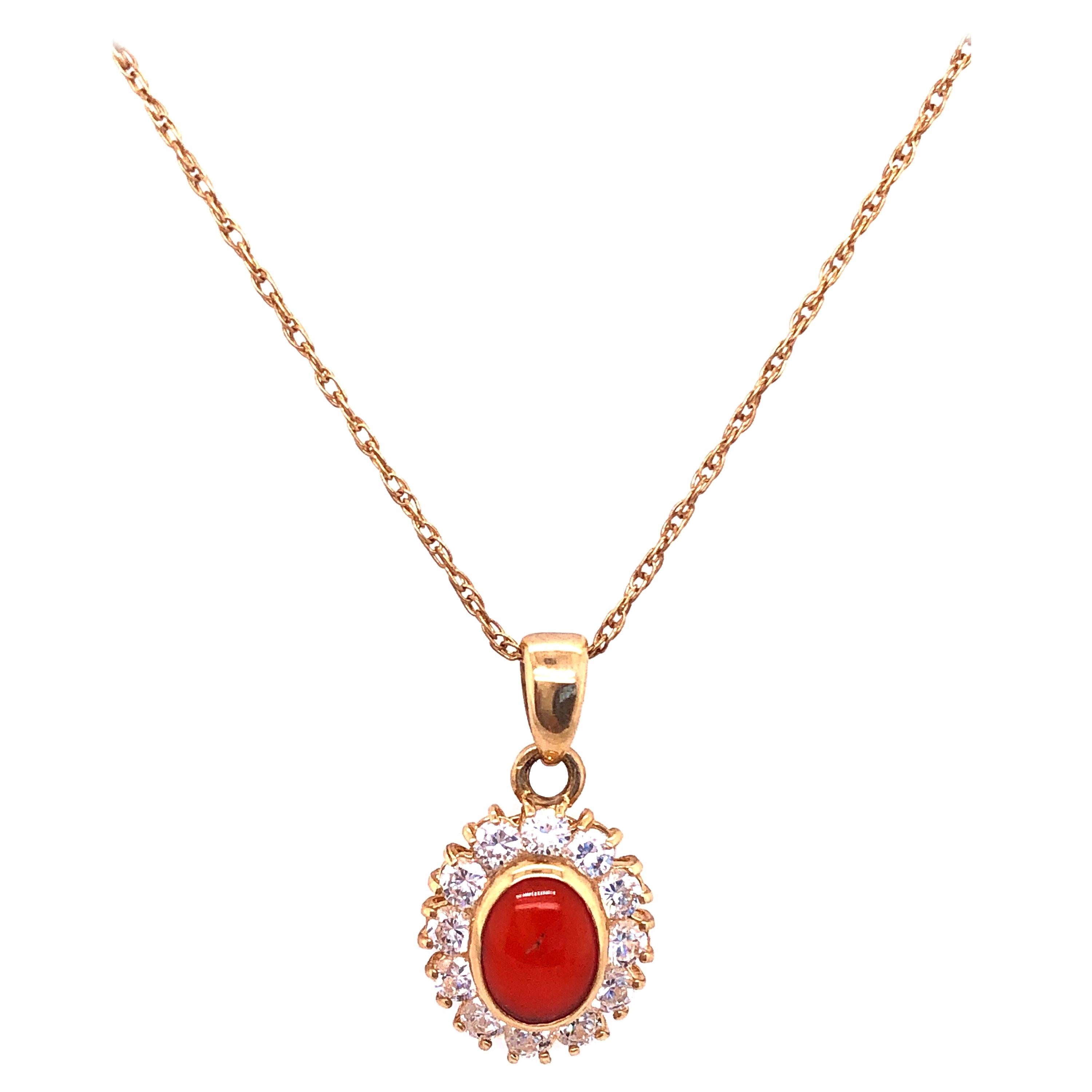 14 Karat Yellow Gold Necklace with Oval Coral and Round Zirconium Pendant For Sale