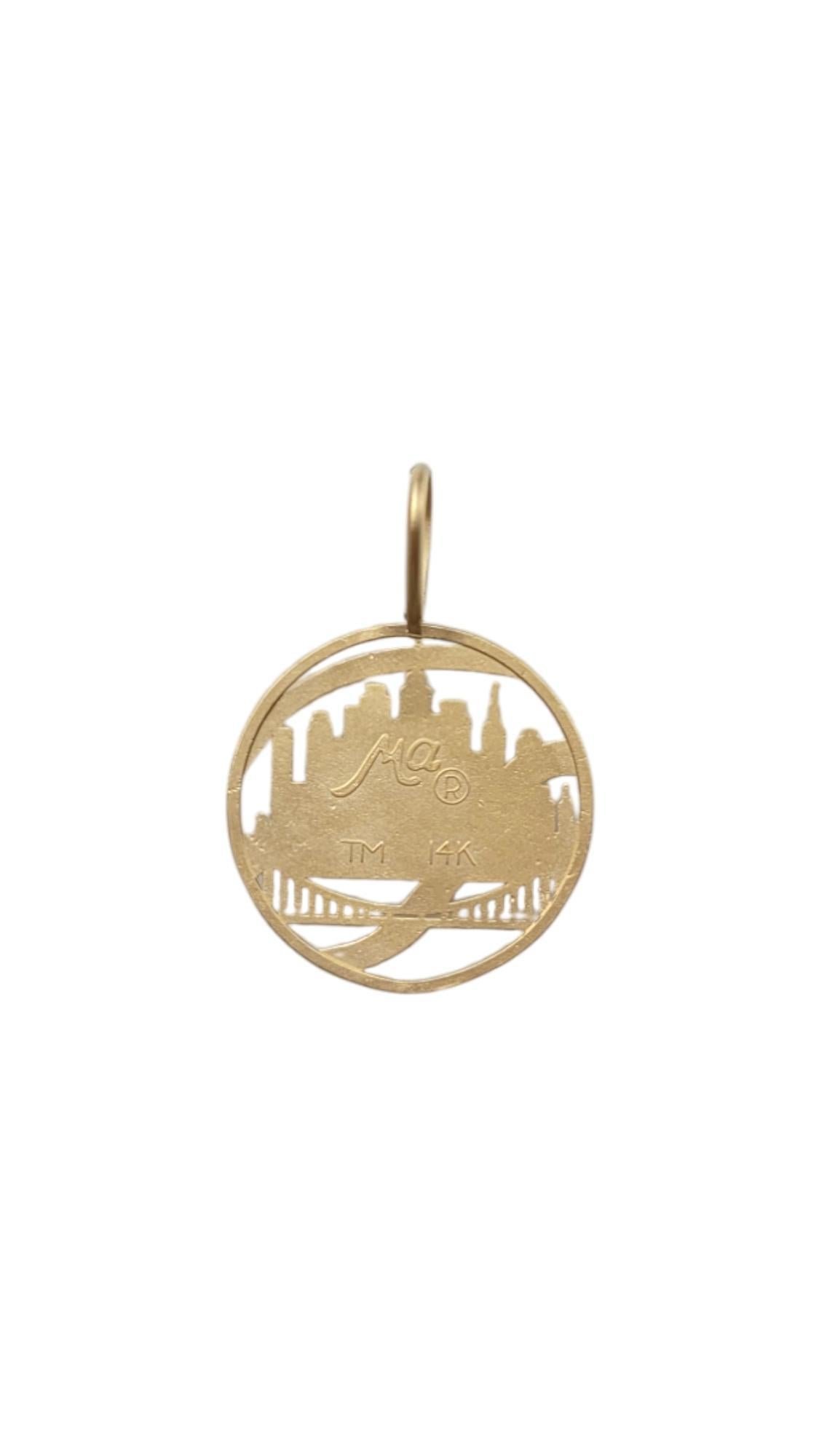 14K Yellow Gold NY Mets Charm-

This 14K yellow gold NY Mets charm features the iconic team logo with precise craftsmanship, celebrating your passion for baseball. Perfect for dedicated fans, this charm adds a sporty and personal touch to any