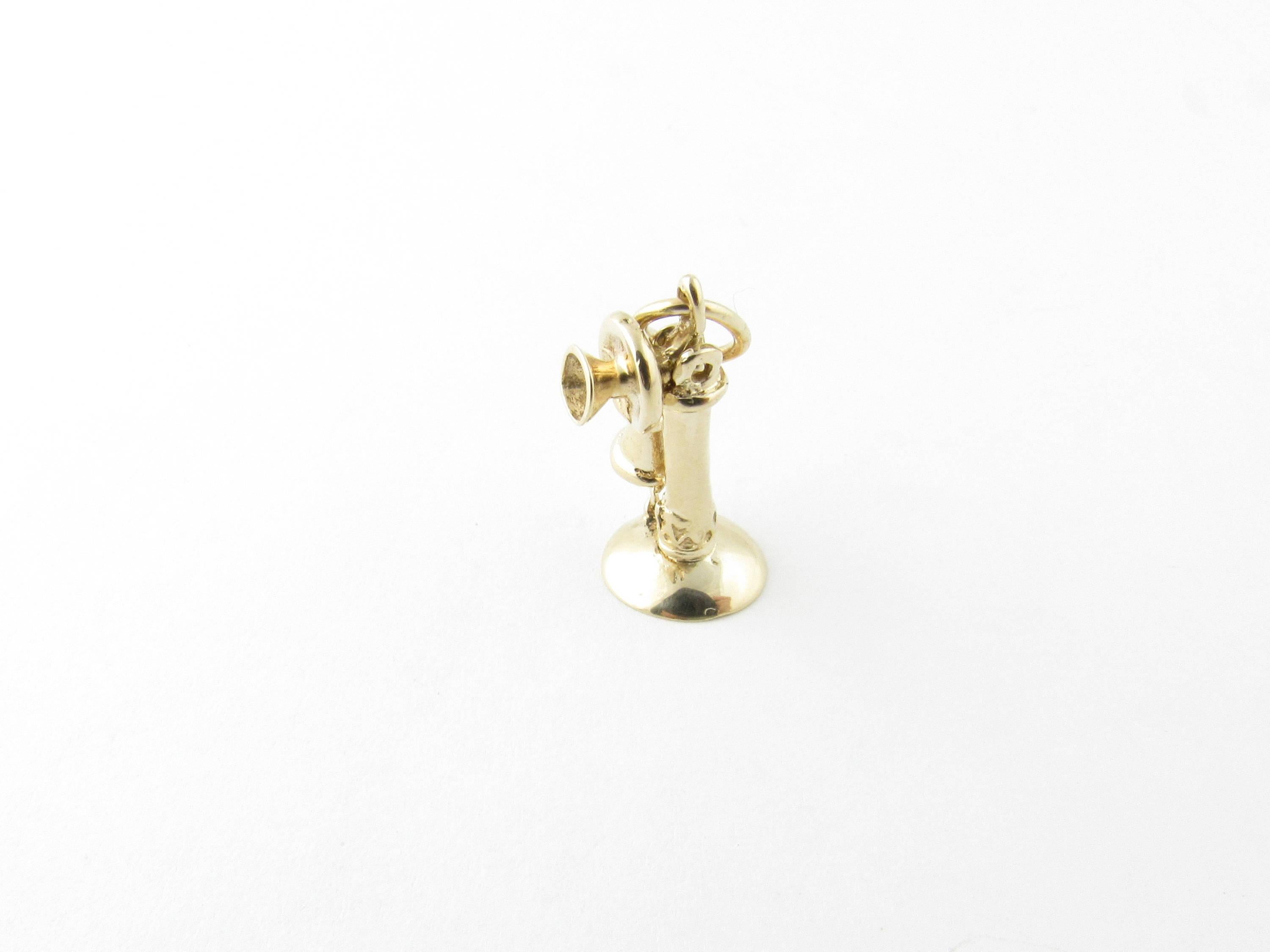 Vintage 14 Karat Yellow Gold Old-Fashioned Telephone Charm-

Go back to a simpler time!

This lovely 3D charm features a miniature old-fashioned telephone meticulously detailed in 14K yellow gold.

Size:  20 mm x  9 mm (actual charm)

Weight:  1.5
