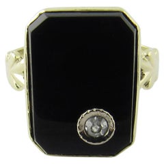 14 Karat Yellow Gold Onyx and Diamond Ring 14 Karat Yellow Gold Onyx and Diamond Ring