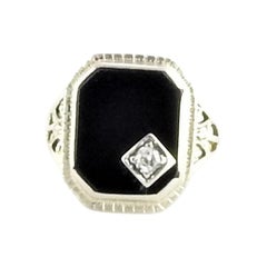 14 Karat Yellow Gold Onyx and Diamond Ring