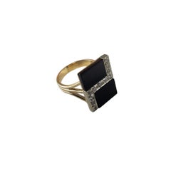 14 Karat Yellow Gold Onyx and Diamond Ring