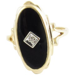 14 Karat Yellow Gold Onyx and Diamond Ring
