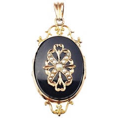 14 Karat Yellow Gold Onyx and Pearl Locket