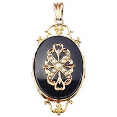 14 Karat Yellow Gold Onyx and Pearl Locket