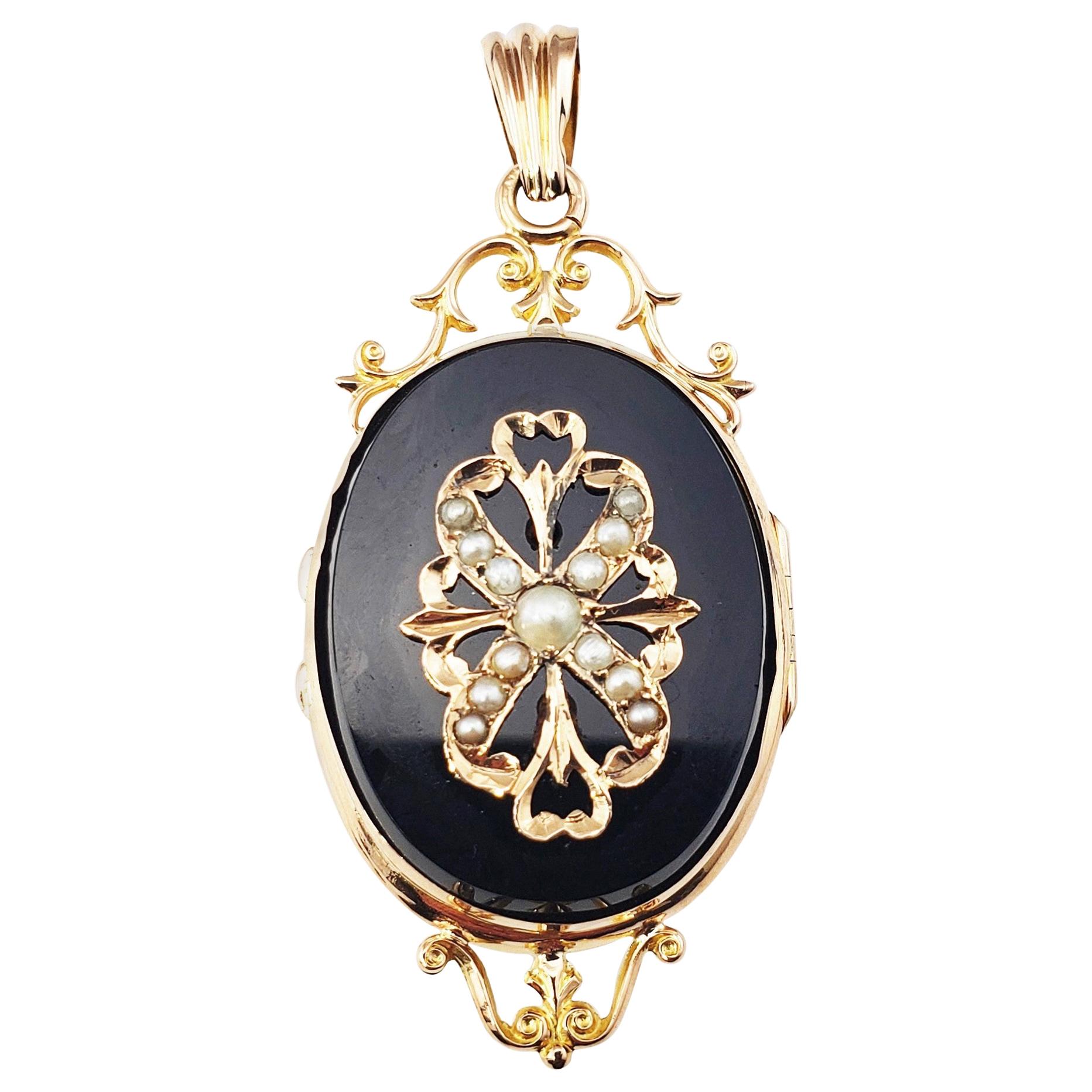 14 Karat Yellow Gold Onyx and Pearl Locket