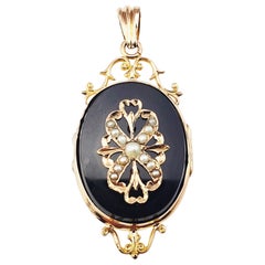 14 Karat Yellow Gold Onyx and Pearl Locket