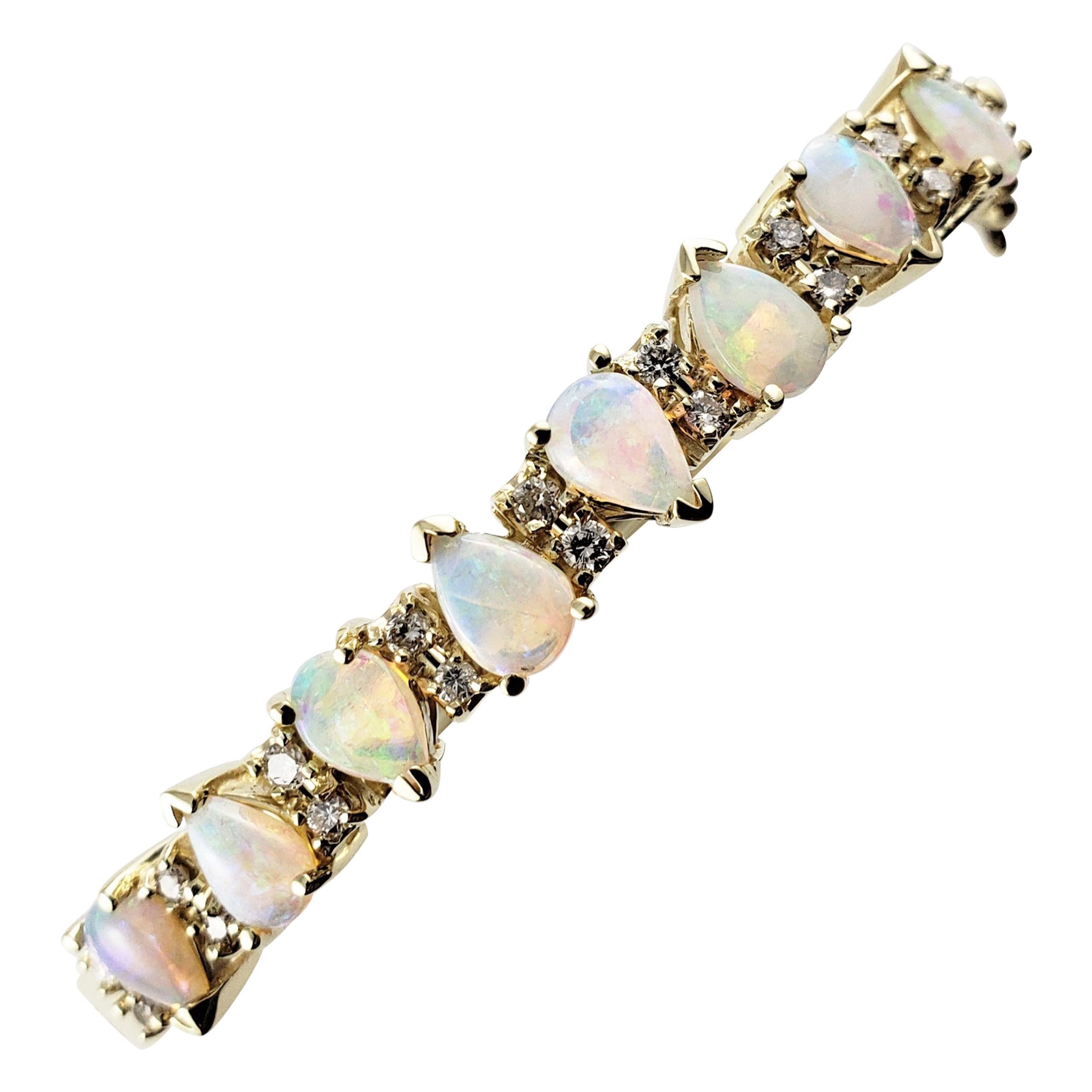 14 Karat Yellow Gold Opal and Diamond Bangle Bracelet