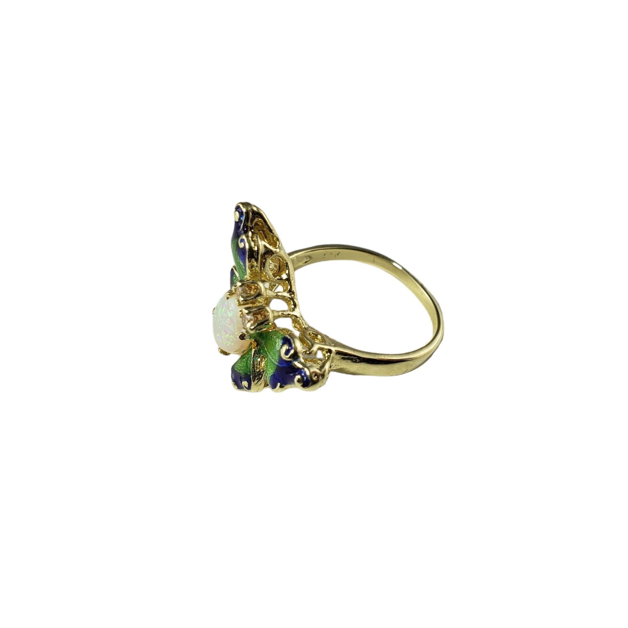Vintage 14 Karat Yellow Gold Opal and Diamond Butterfly Ring Size 7.25-

This lovely butterfly ring features one oval opal (9 mm x 6 mm) and two round brilliant cut diamonds set in beautifully detailed 14K yellow gold. Accented with colorful blue