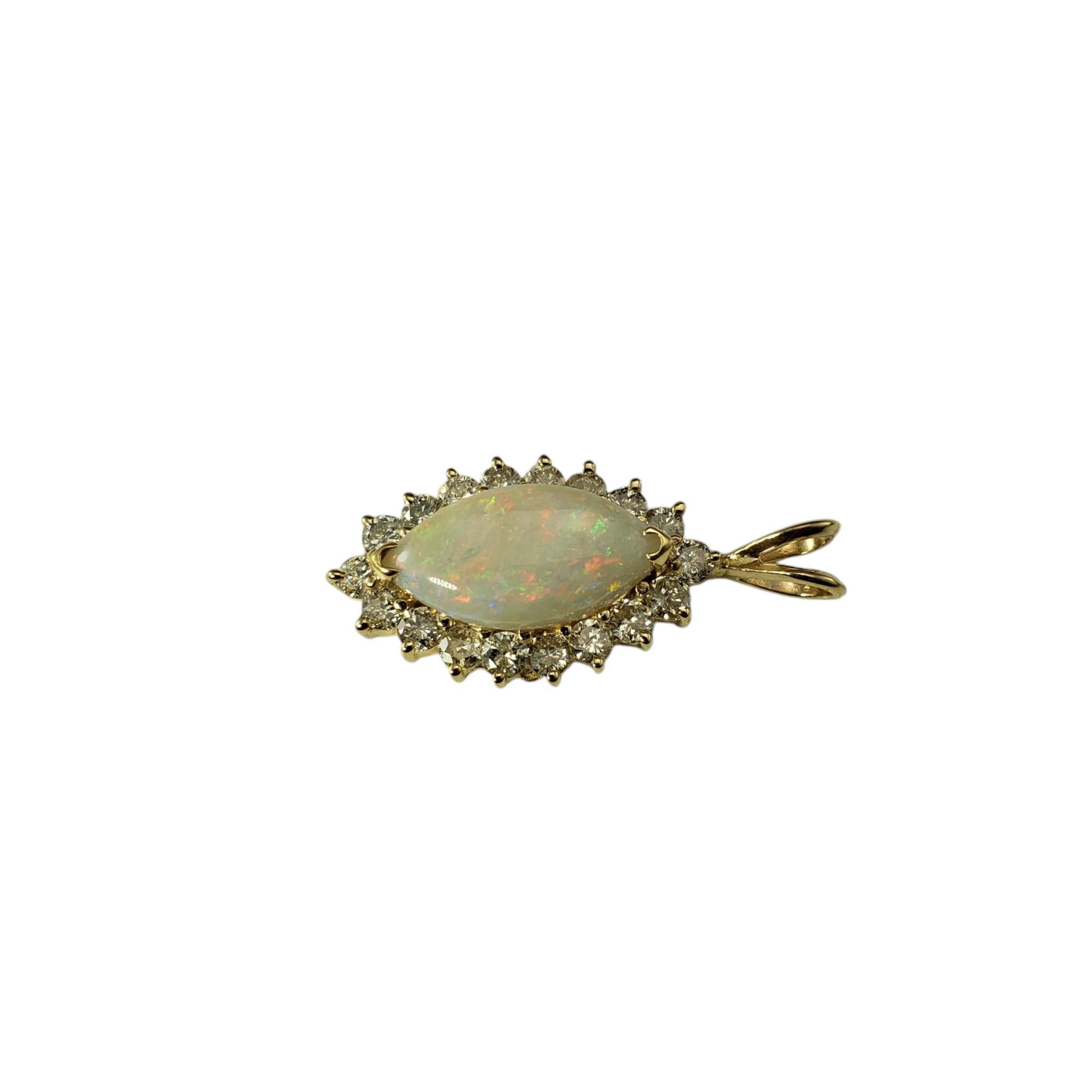 Collier en or jaune 14 carats avec pendentif en opale et diamant

Cet élégant pendentif présente une opale cabochon blanche de forme marquise (16,5 mm x 8,2 mm) entourée de 18 diamants ronds de taille brillant sertis dans de l'or jaune 14K.

Bague
