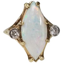 14 Karat Yellow Gold Opal and Diamond Ring 14 Karat Yellow Gold Opal and Diamond Ring