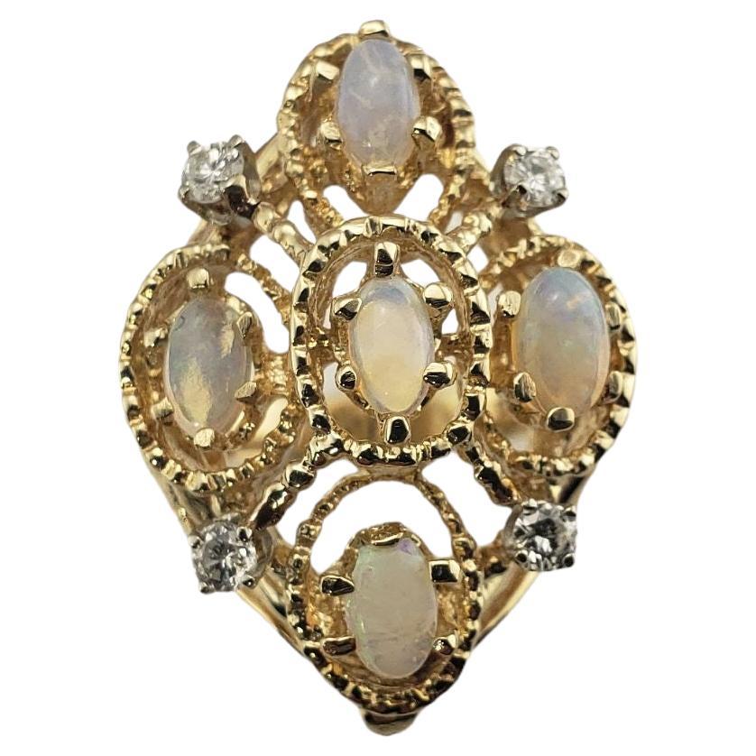 14 Karat Yellow Gold Opal and Diamond Ring