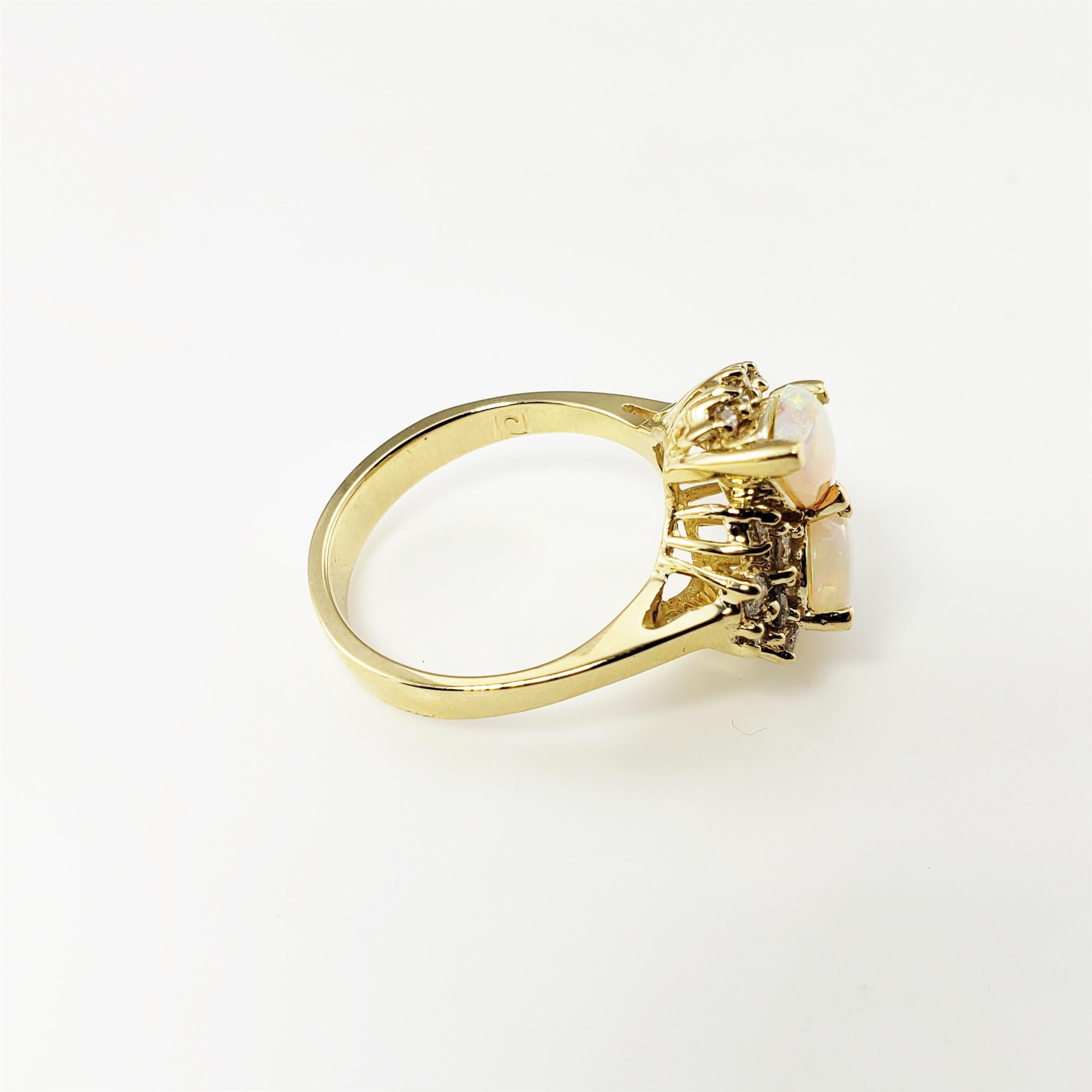 Anillo de oro amarillo de 14 quilates con ópalo y diamantes Corte brillante