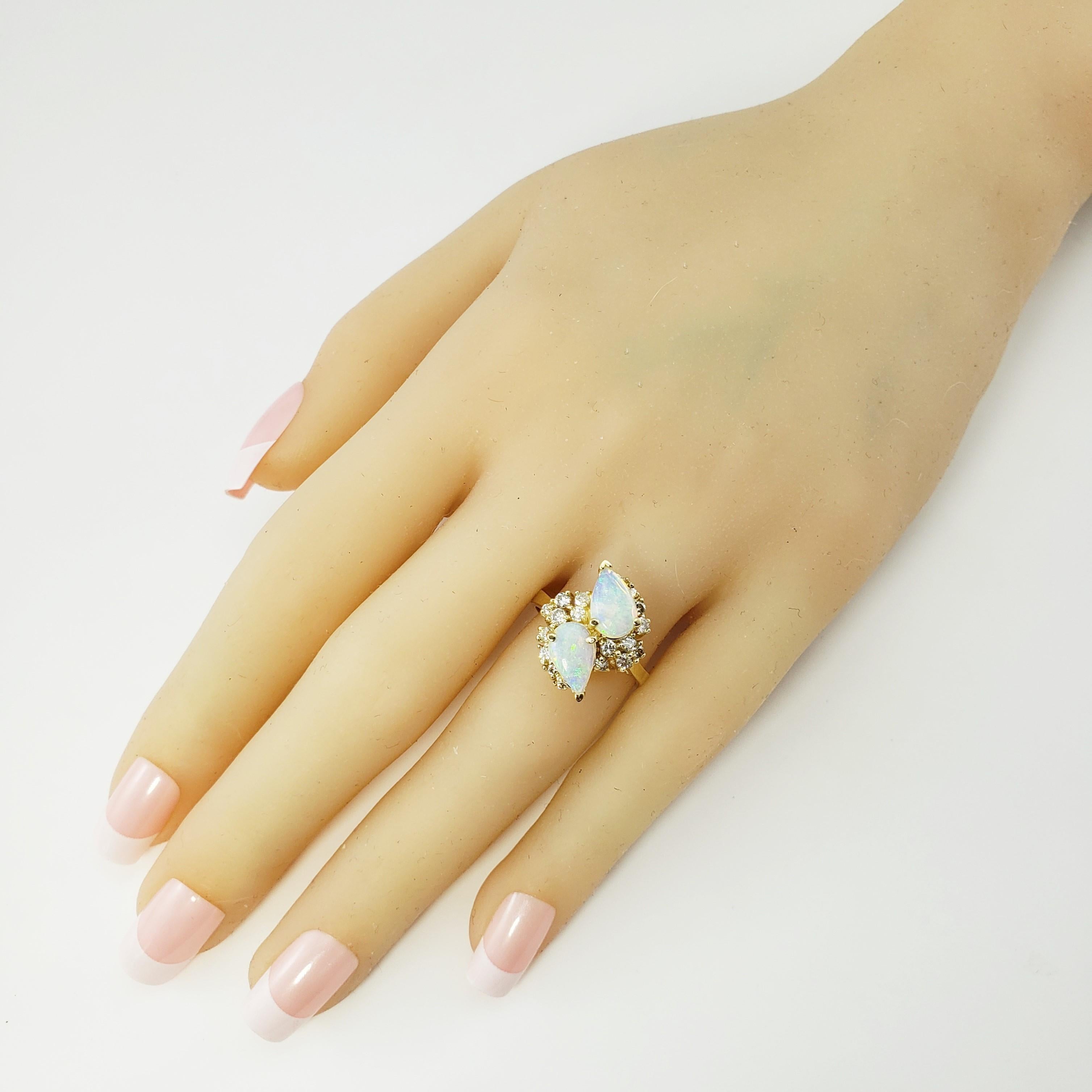 Anillo de oro amarillo de 14 quilates con ópalo y diamantes 3