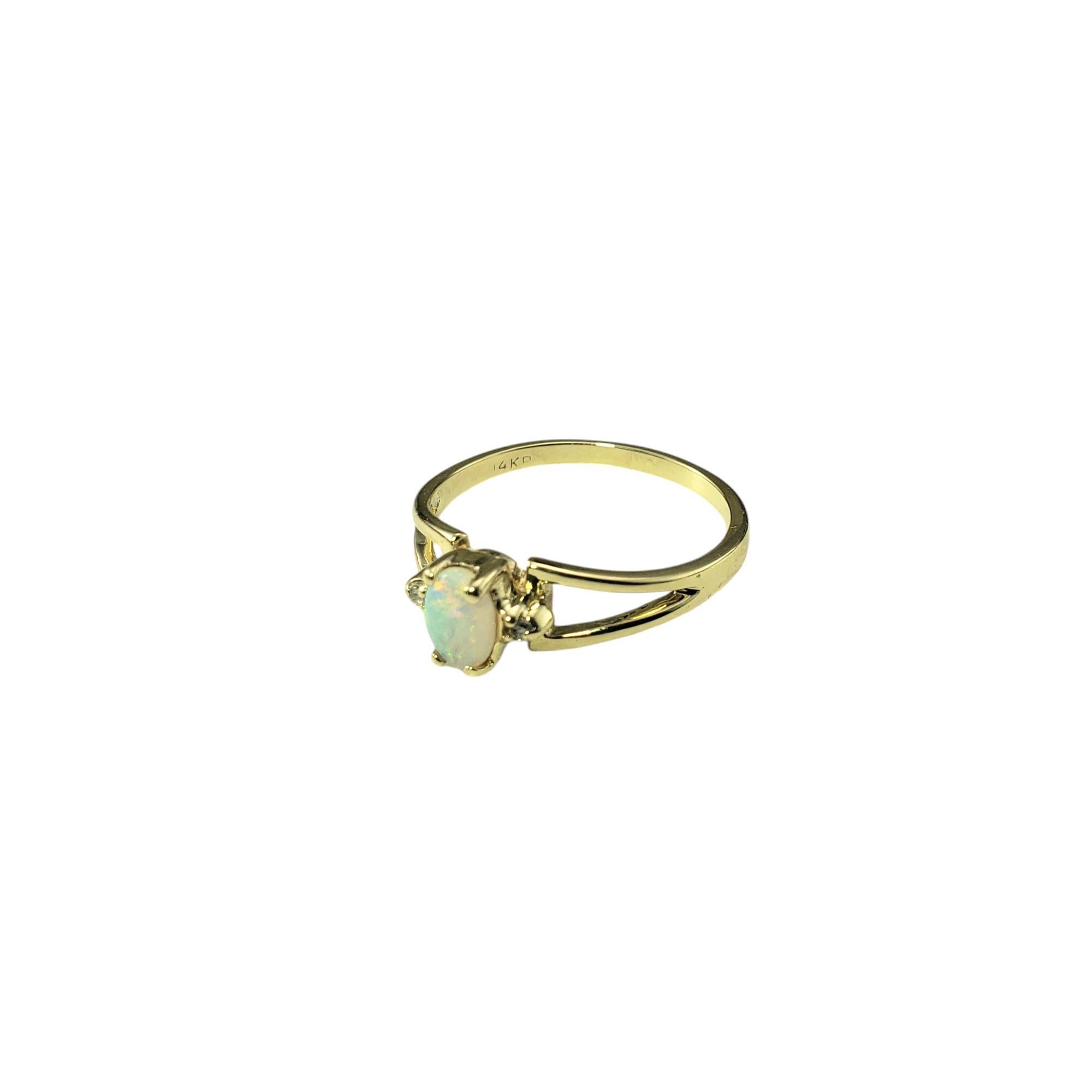 Anillo de oro amarillo de 14 quilates con ópalo y diamantes talla 7,5 #20752 Corte oval en venta