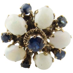 Vintage 14 Karat Yellow Gold Opal and Sapphire Flower Ring