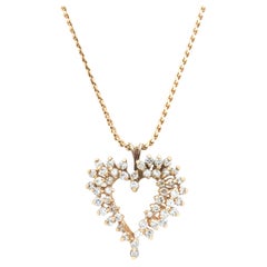 14 Karat Yellow Gold Open Heart Diamond Necklace