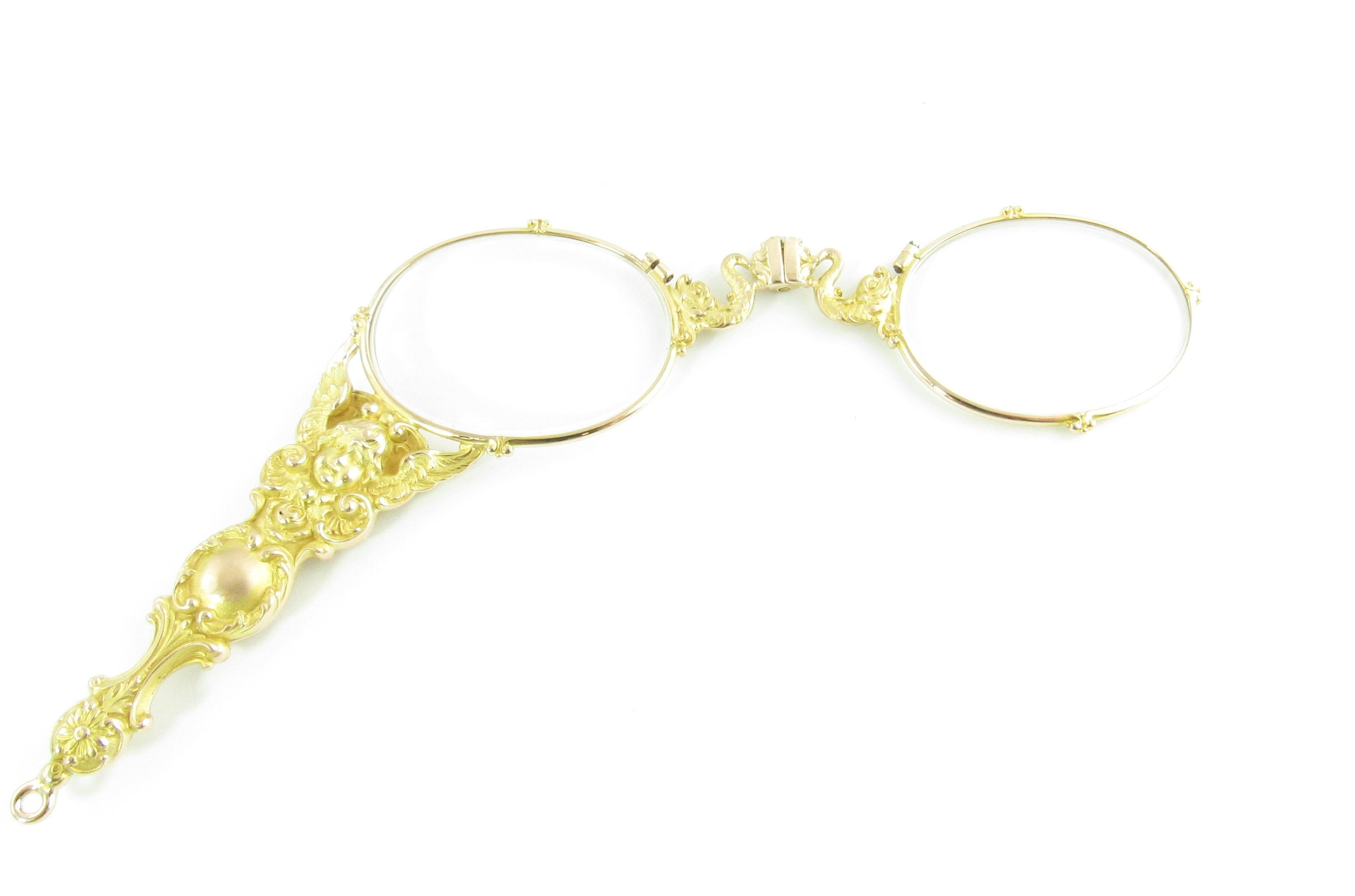 Antique Victorian 14 Karat Yellow Gold Opera Glasses

This gorgeous lorgnette features folding frames and exquisitely detailed handle and bridge. Frame measures 3.9 inches across. Each lens measures 42 mm. Handle measures 57 mm.

Size: 57 mm