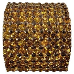 Anillo de oro amarillo de 14 quilates con zafiro naranja y diamantes #14006