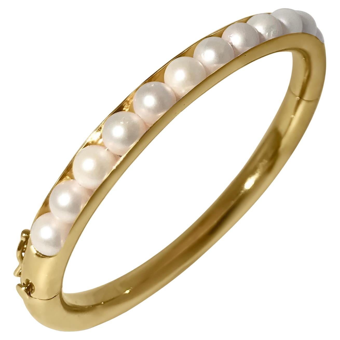 14 Karat Yellow Gold Oval Bangle Bracelet with T-Pearls by Manart For Sale