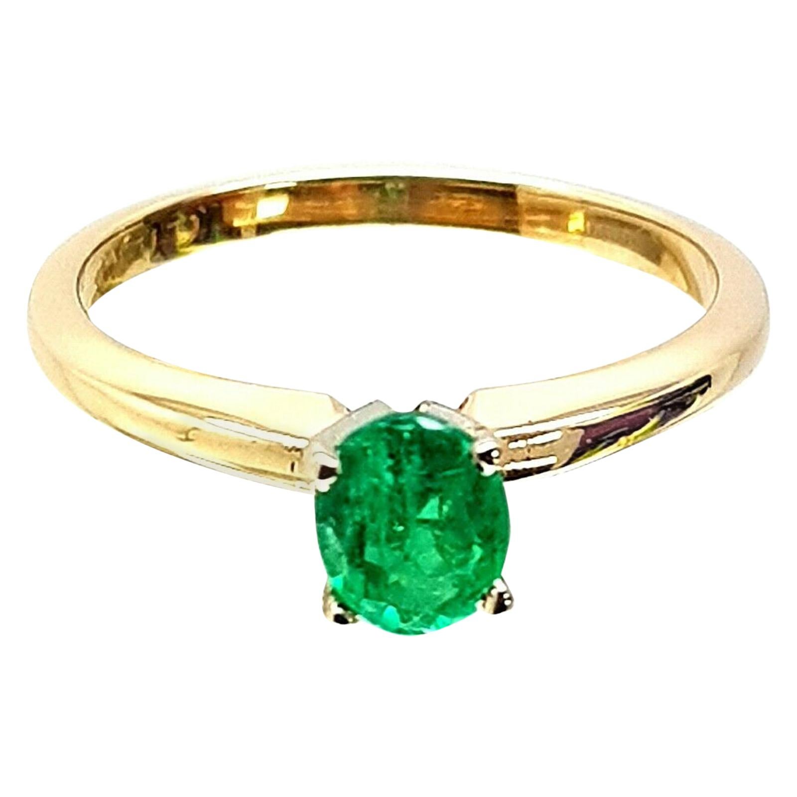 14 Karat Yellow Gold Oval Cut Emerald Solitaire Ring