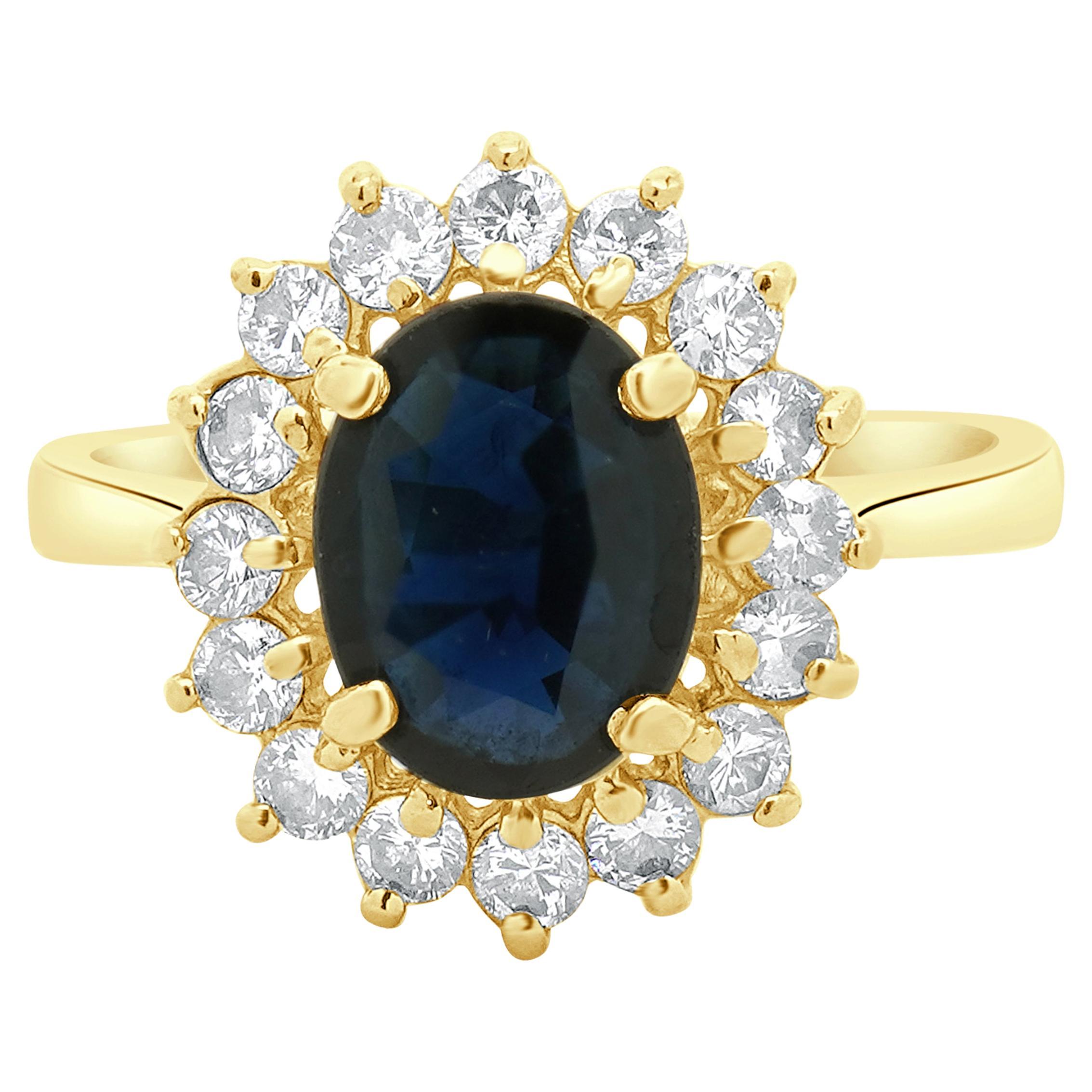 14 Karat Yellow Gold Oval Cut Sapphire and Diamond Ring