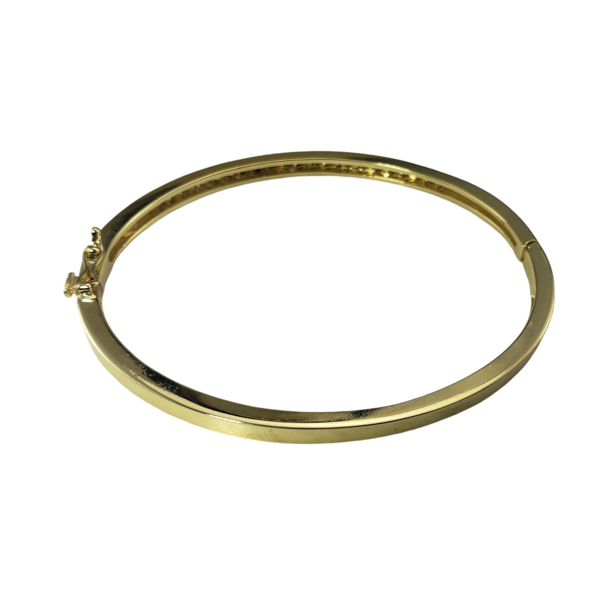 Women's 14 Karat Yellow Gold Oval Diamond Bangle Bracelet #19232 For Sale