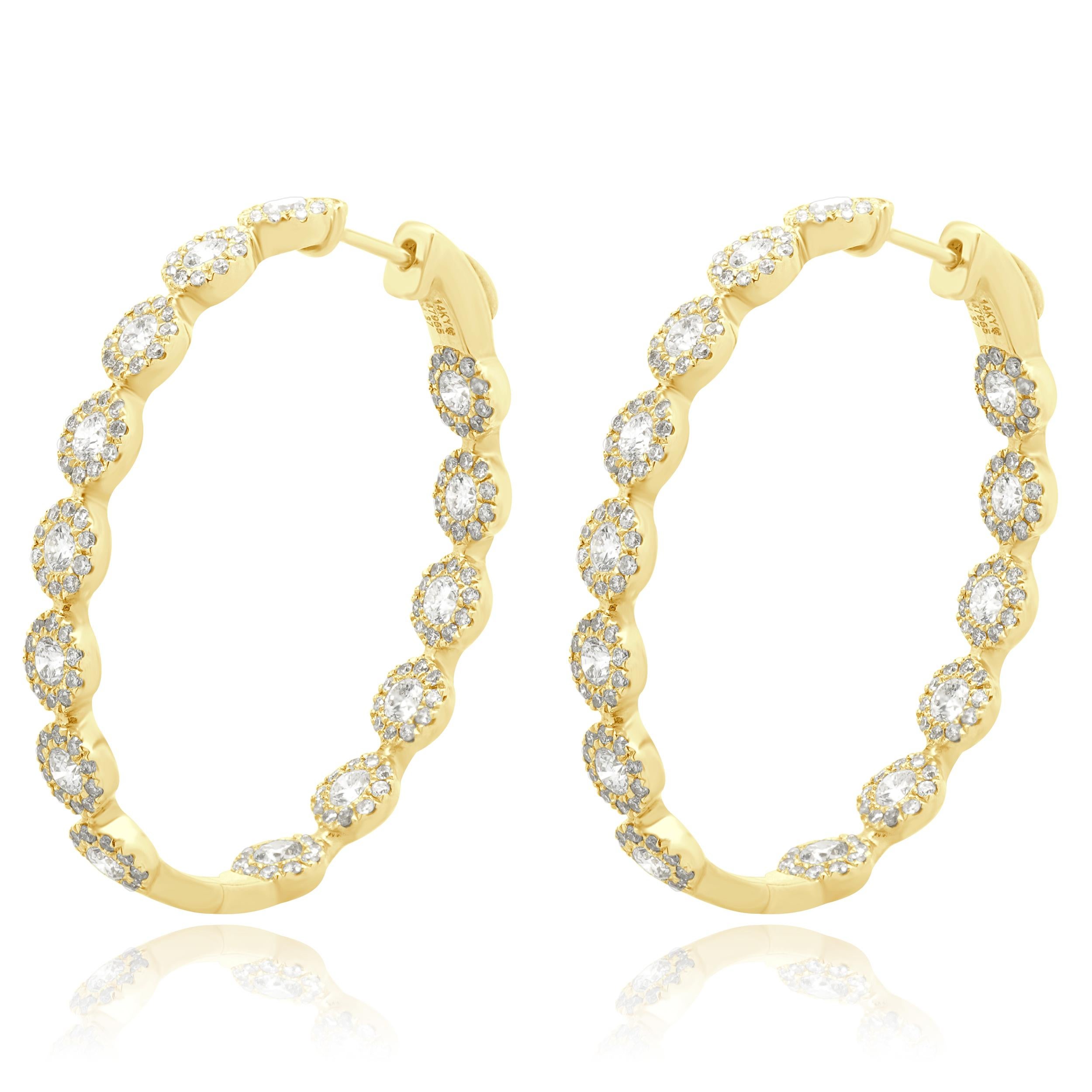 Designer: custom
Material: 14K yellow gold
Diamond: 308 round brilliant cut = 4.34cttw
Color: G 
Clarity: SI1
Weight: 11.82 grams
