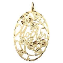 Charm madre ovale in filigrana in oro giallo 14 carati #20863