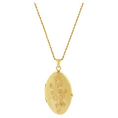 Collar Relicario Ovalado Floral Grabado Oro Amarillo 14 Kilates