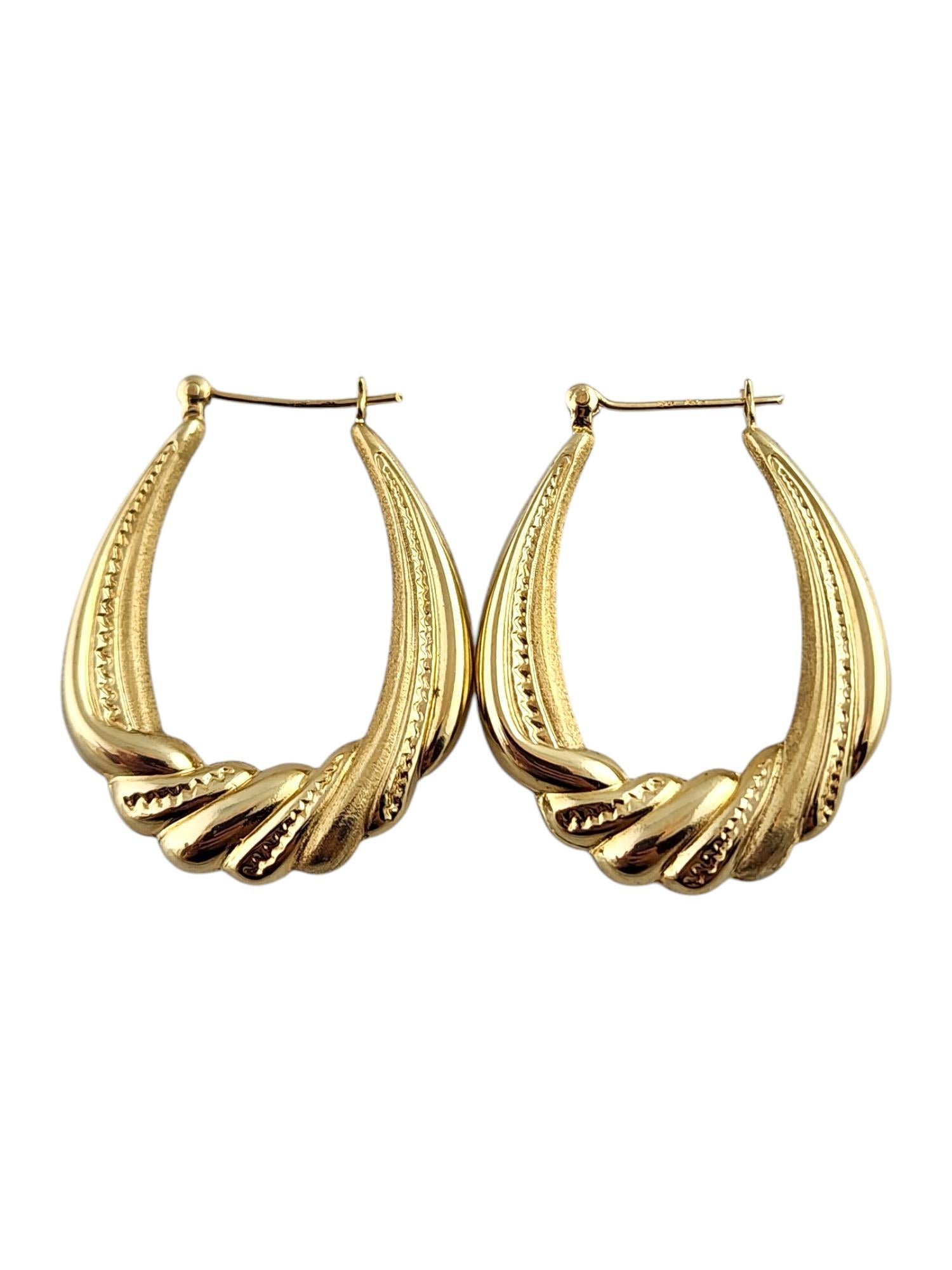 Créoles ovales en or jaune 14 carats #19343 Pour femmes en vente