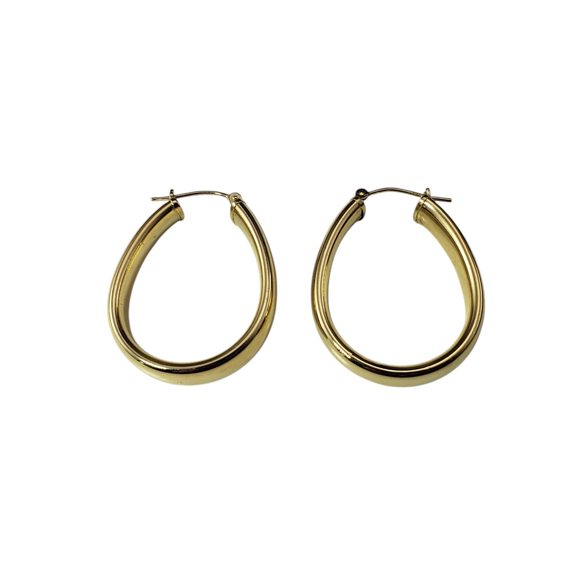 Women's 14 Karat Yellow Gold Oval Hoop Earrings #19758 For Sale