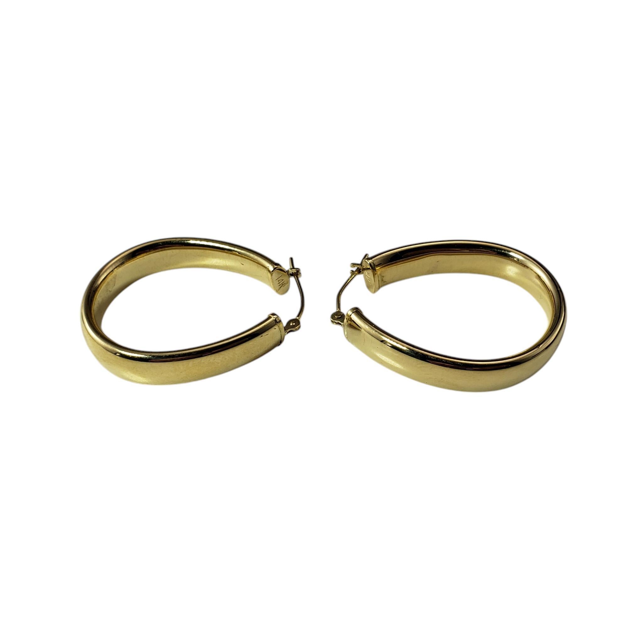 Pendientes de aro ovalados de oro amarillo de 14 quilates #19758
